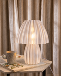 Jellyfish Clear table lamp on a book